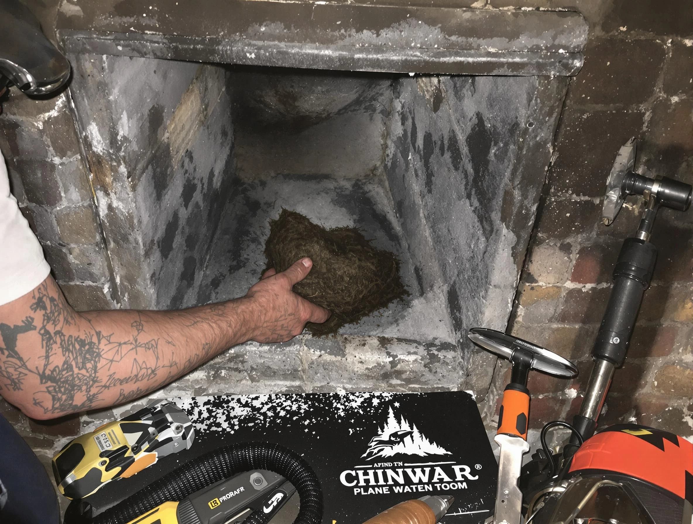 New City Chimney Sweep safely removing debris and screening chimney in New City, NY